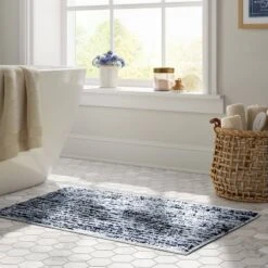 20"x32" Spacedye Striped Bath Rug - Thresholdâ˘